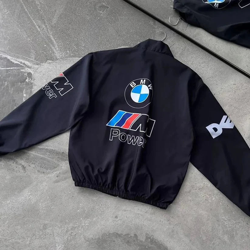 Black bomber-style racing jacket with BMW crest and M Power logo centered on chest