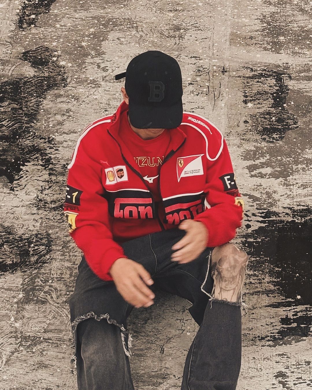 Red Ferrari racing jacket with zip front and sleeve logo patches