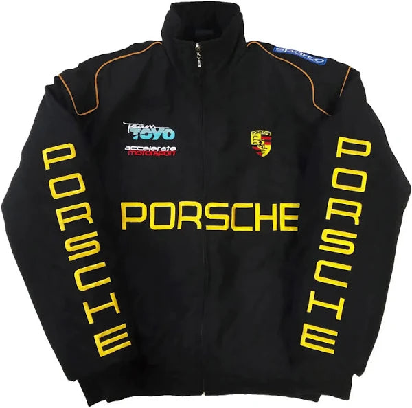 Black zip-up racing jacket with large yellow PORSCHE graphic, crest patch, and piping