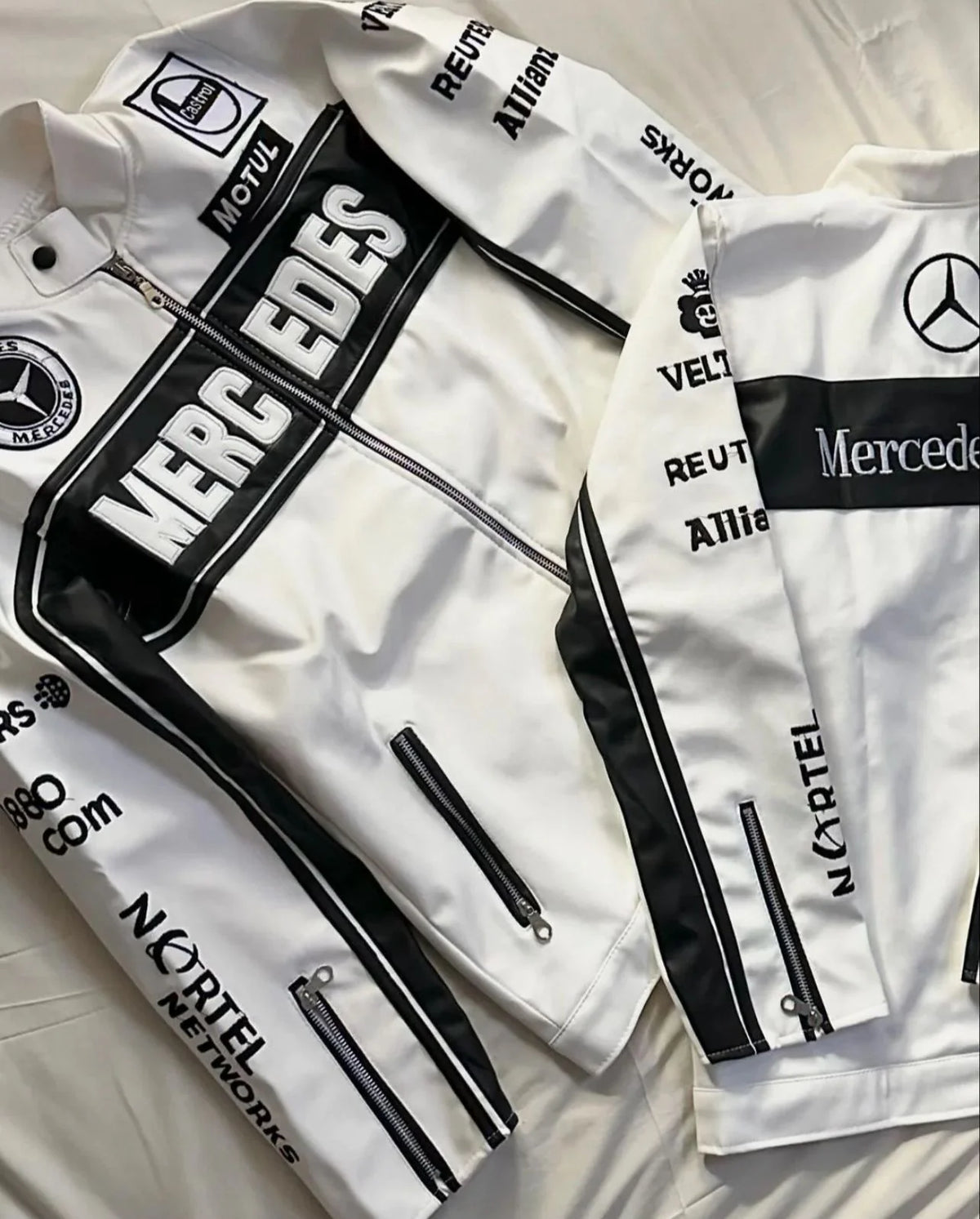 White racing leather jacket with black stripes, embroidered Mercedes-style logos, zip front