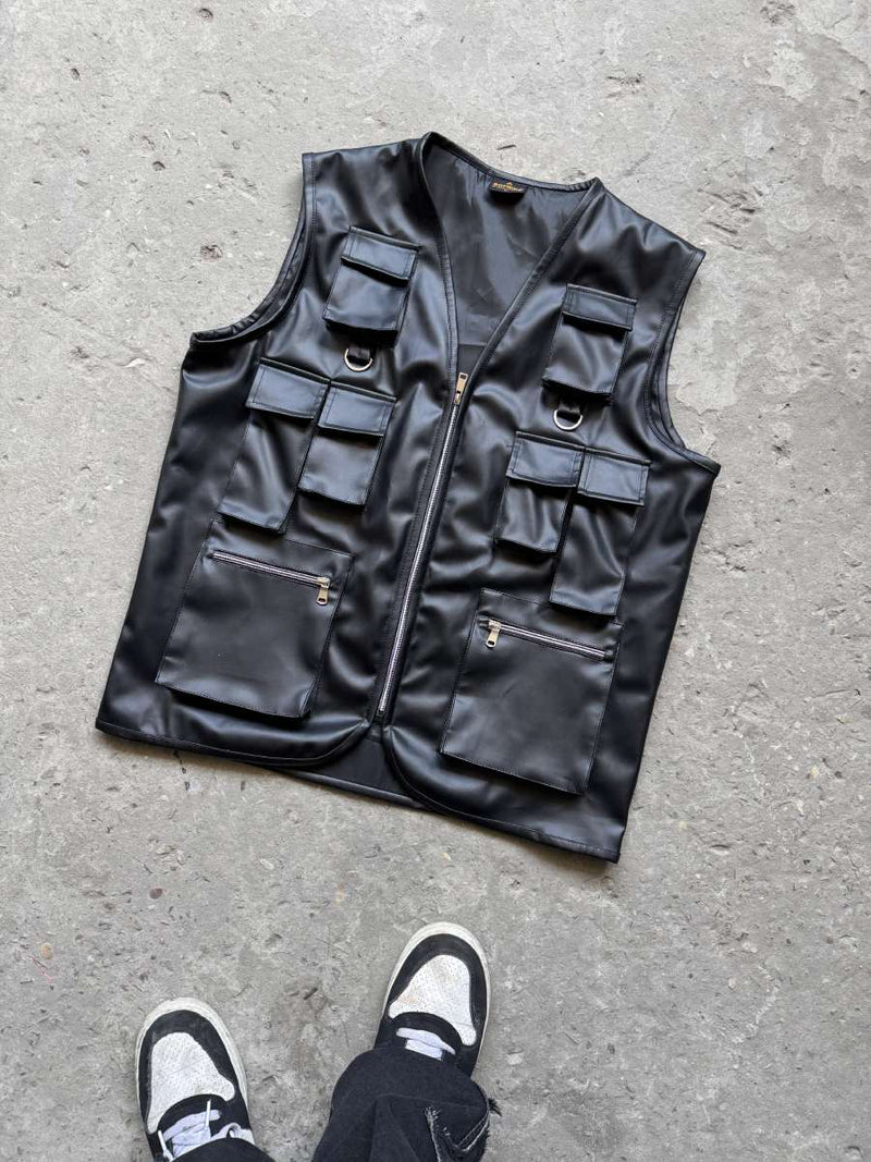 Black leather utility vest, angled view, front zip with flap chest and cargo pockets