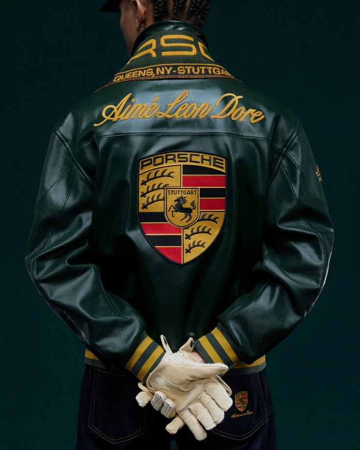 Dark green leather racing jacket with Porsche crest and gold striped cuffs