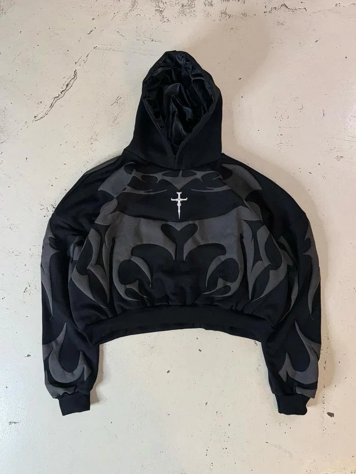 Black pullover hoodie with tribal shadow graphic print and embroidered chest logo
