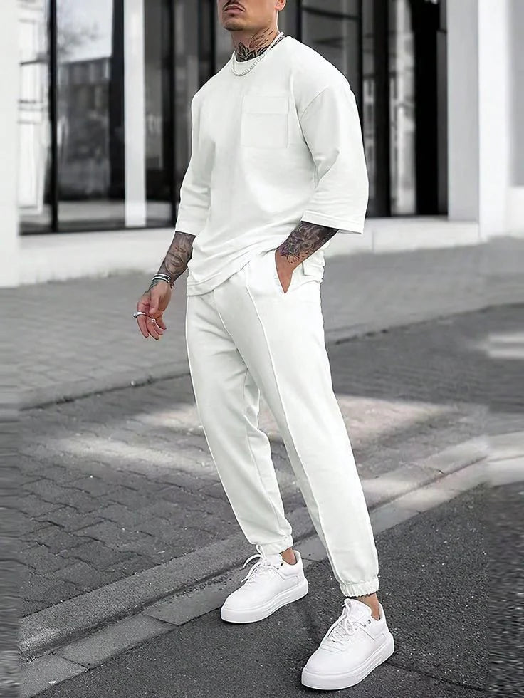 Men's white co-ord tracksuit set with half-sleeve top and jogger pants