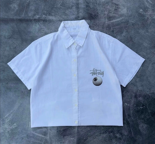 Mercy white oversized eyeball graphic shirt front view streetwear style