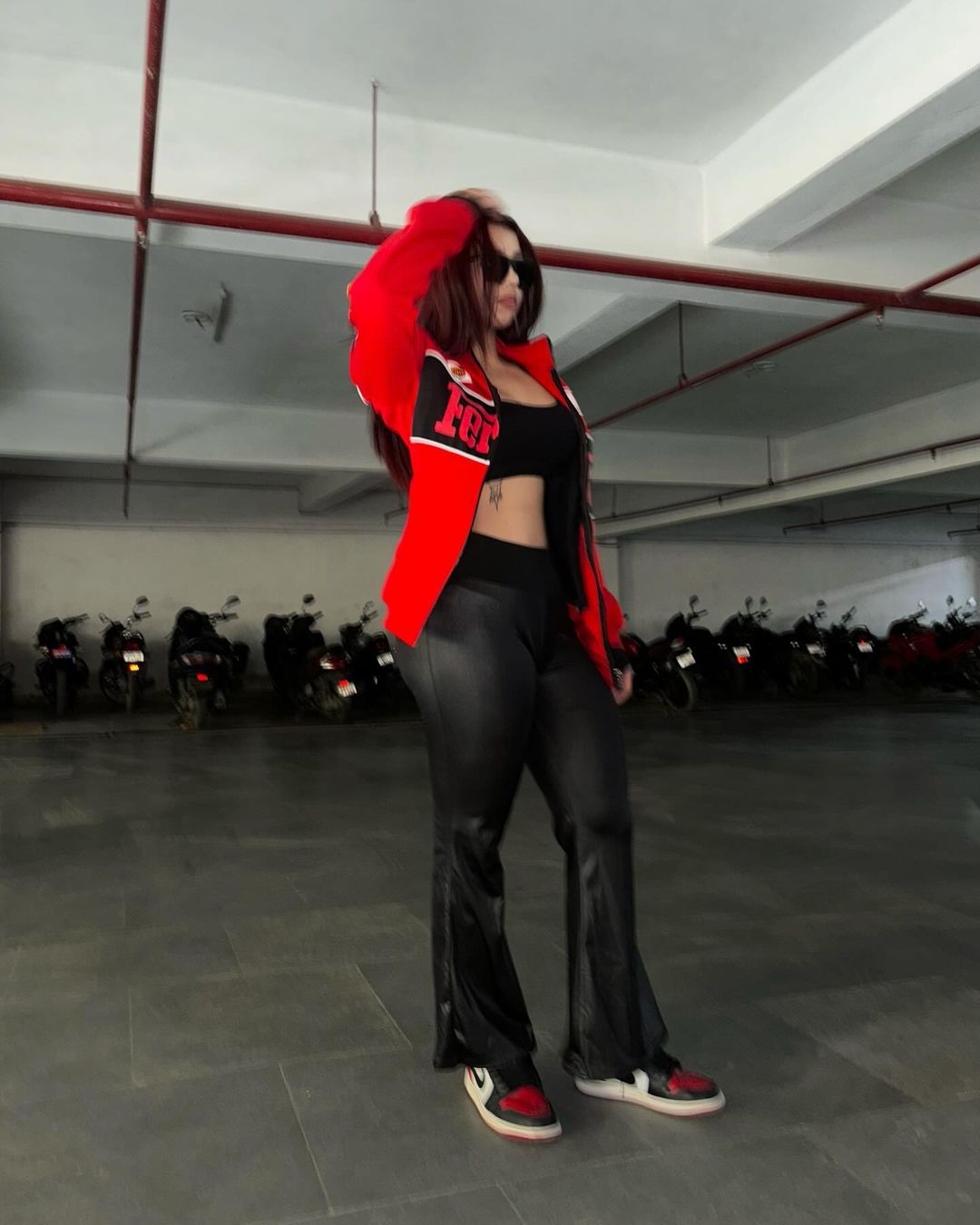 Red Ferrari racing jacket with zip front and chest logo detail