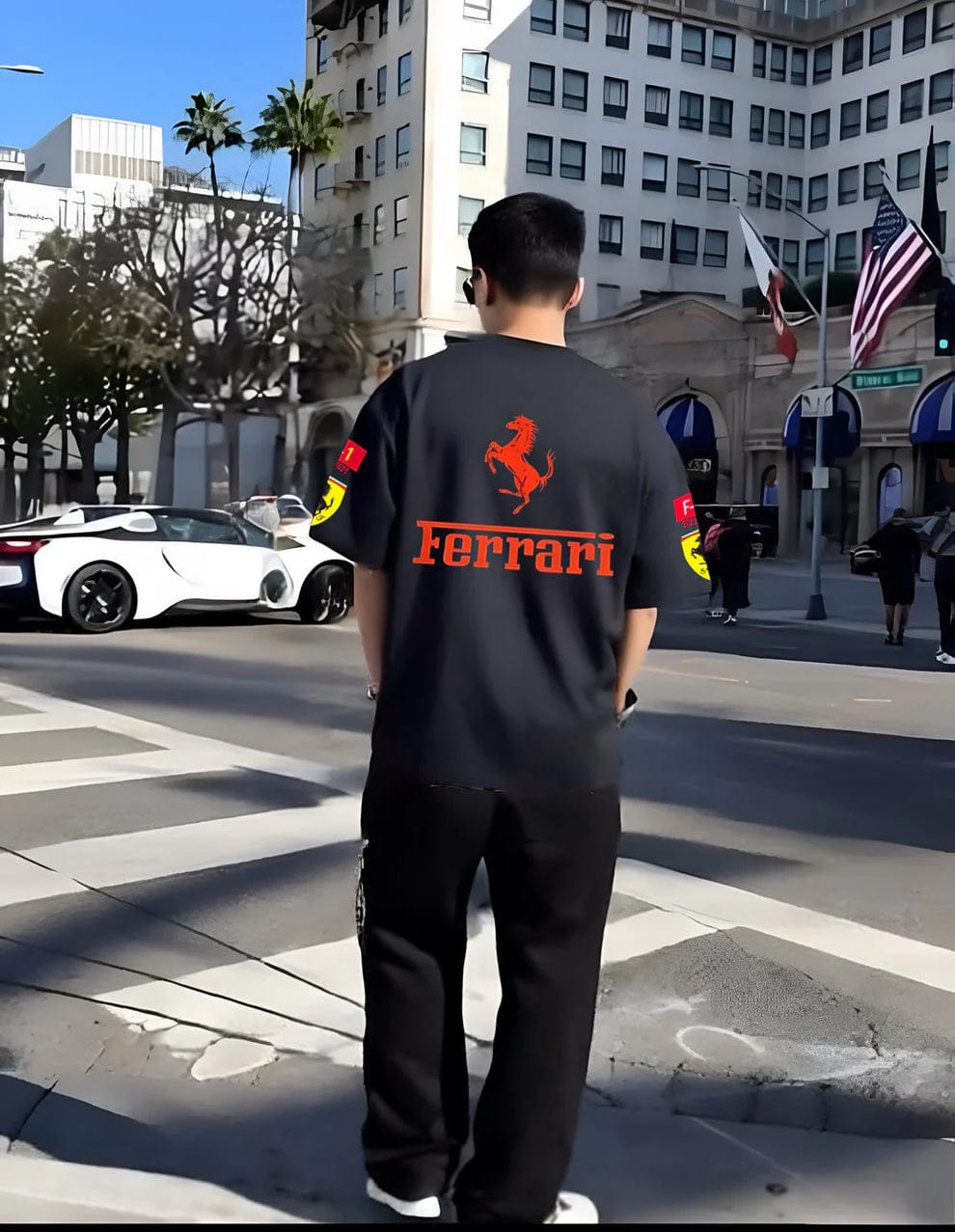 Men's black Ferrari racing T-shirt, back view with red Ferrari emblem and sponsor graphics