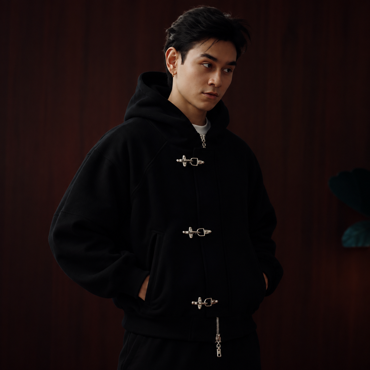 Black fireman clasp hoodie angled model view Mercywear