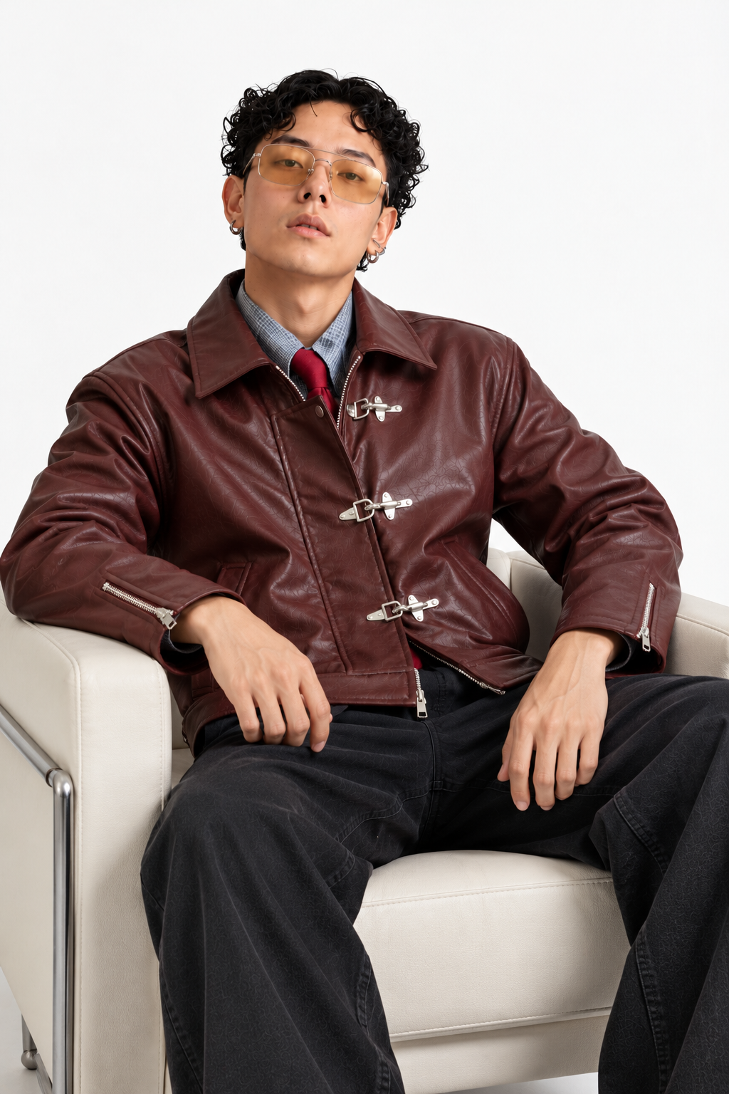 Back view of Mercywear men's burgundy leather-look jacket showcasing its structured boxy silhouette and deep wine-red finish.