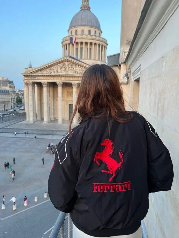 Black bomber jacket back view with red Ferrari logo embroidery, zip front