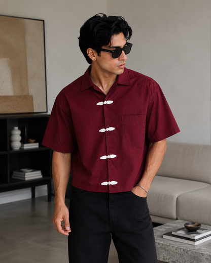Back view of Mercy Wear Burgundy Chinese Button Cropped Shirt showing oversized cropped silhouette, premium cotton fabric, and clean minimal streetwear design.