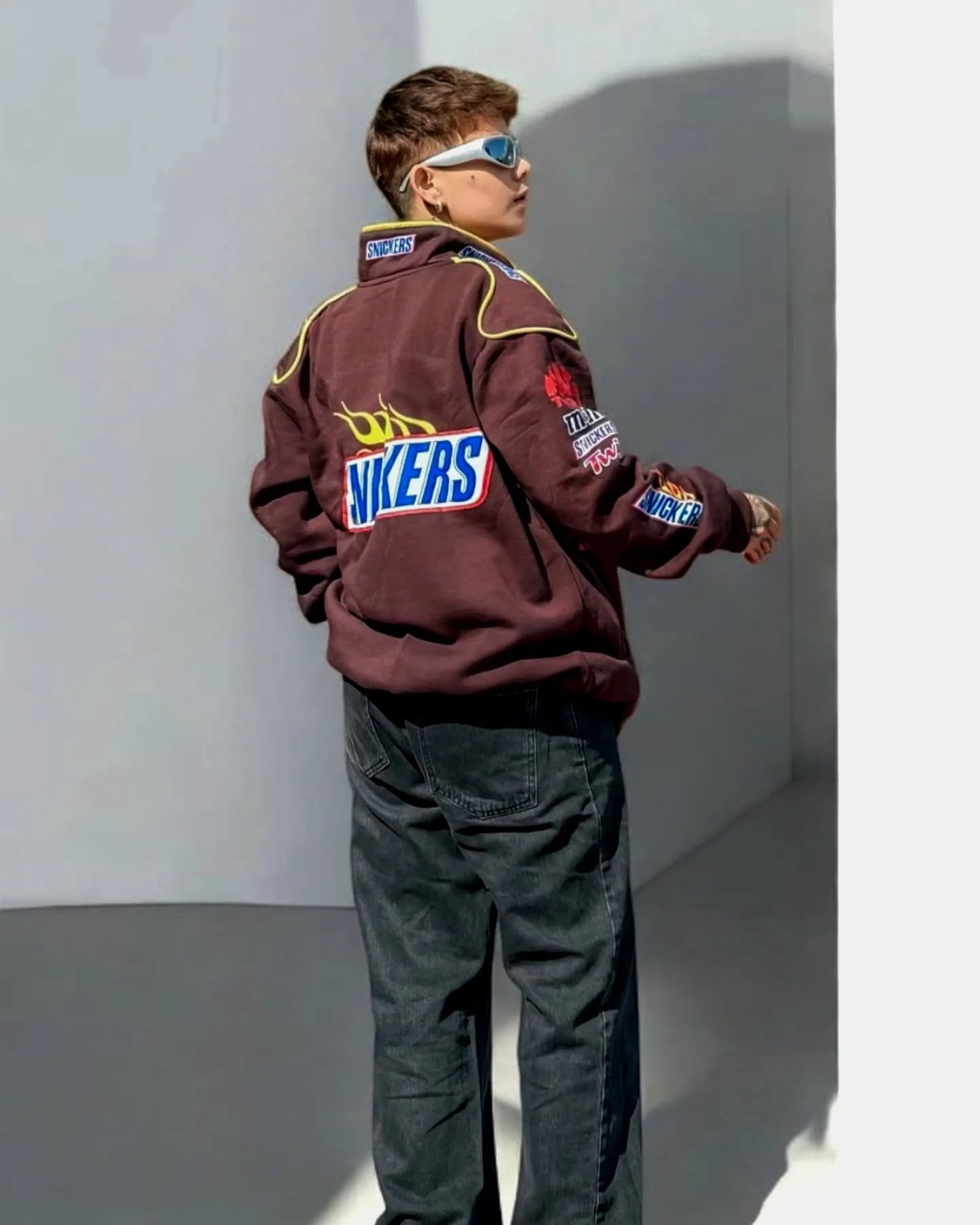 Side view of Snickers Racing Rider Cotton Jacket showcasing sleeves and collar
